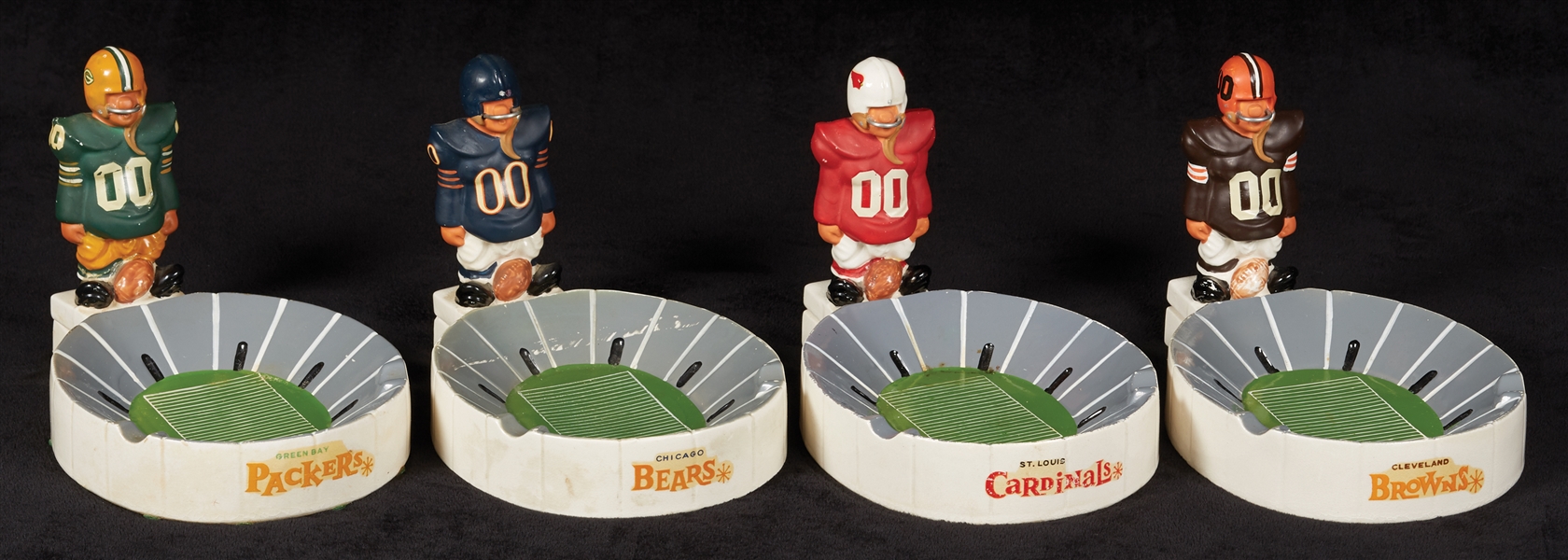 1960s Fred Kail “Joe Jolter” Stadium Ashtray Figures (8)